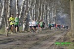 1e kilometer, links in achtervolgend groepje